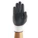 white glove with black palm on hand