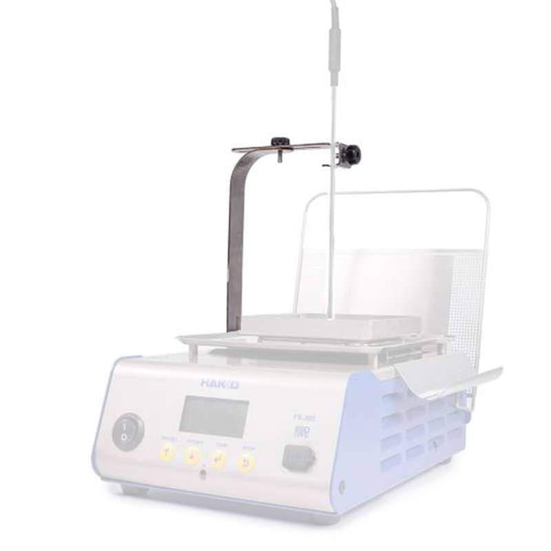 fixture arm attached to faded out equipment