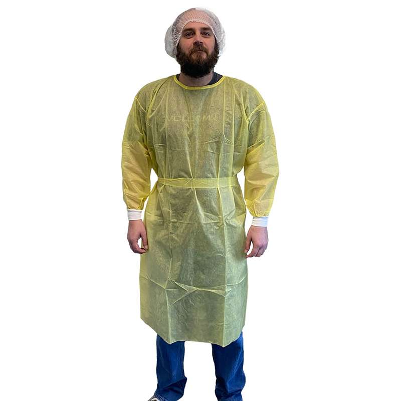 man wearing yellow isolation gown
