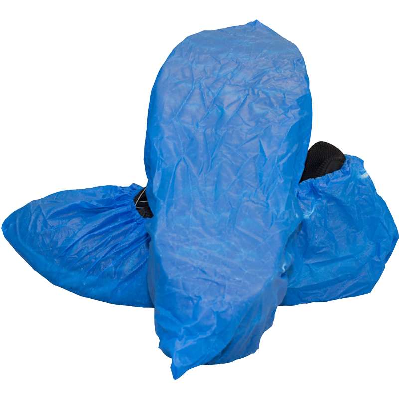 blue shoe covers over black sneakers