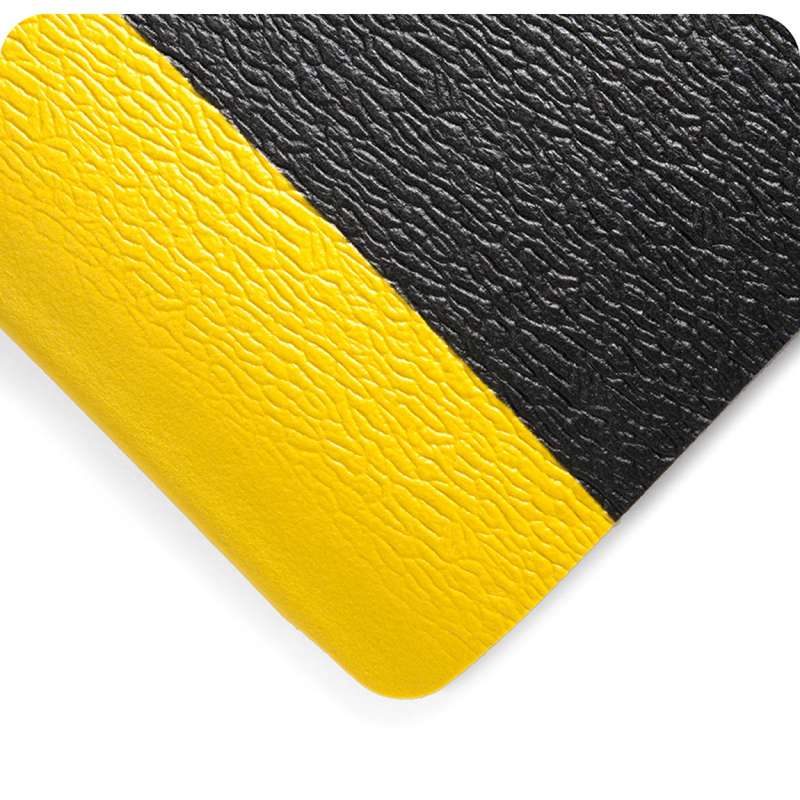 Deluxe Soft Step 3 x 60' Anti-Fatigue Pebble Embossed Black Vinyl Sponge Matting with Yellow Borders, 5/8" Thick