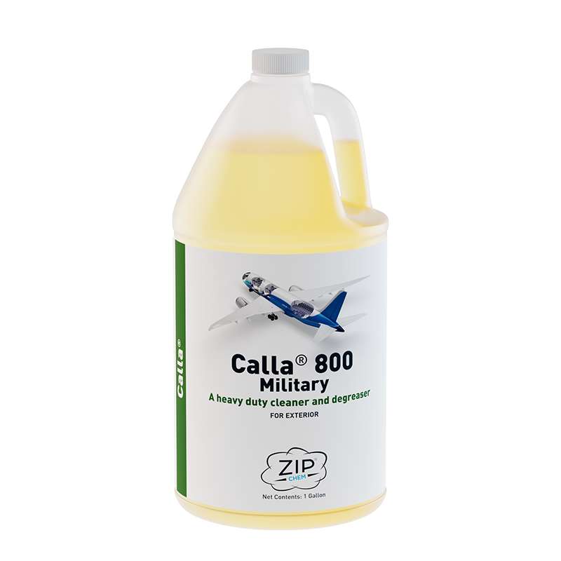 clear bottle of yellow liquid with product label
